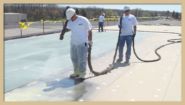 Application of spray adhesive for a EPDM fully-adhered installation